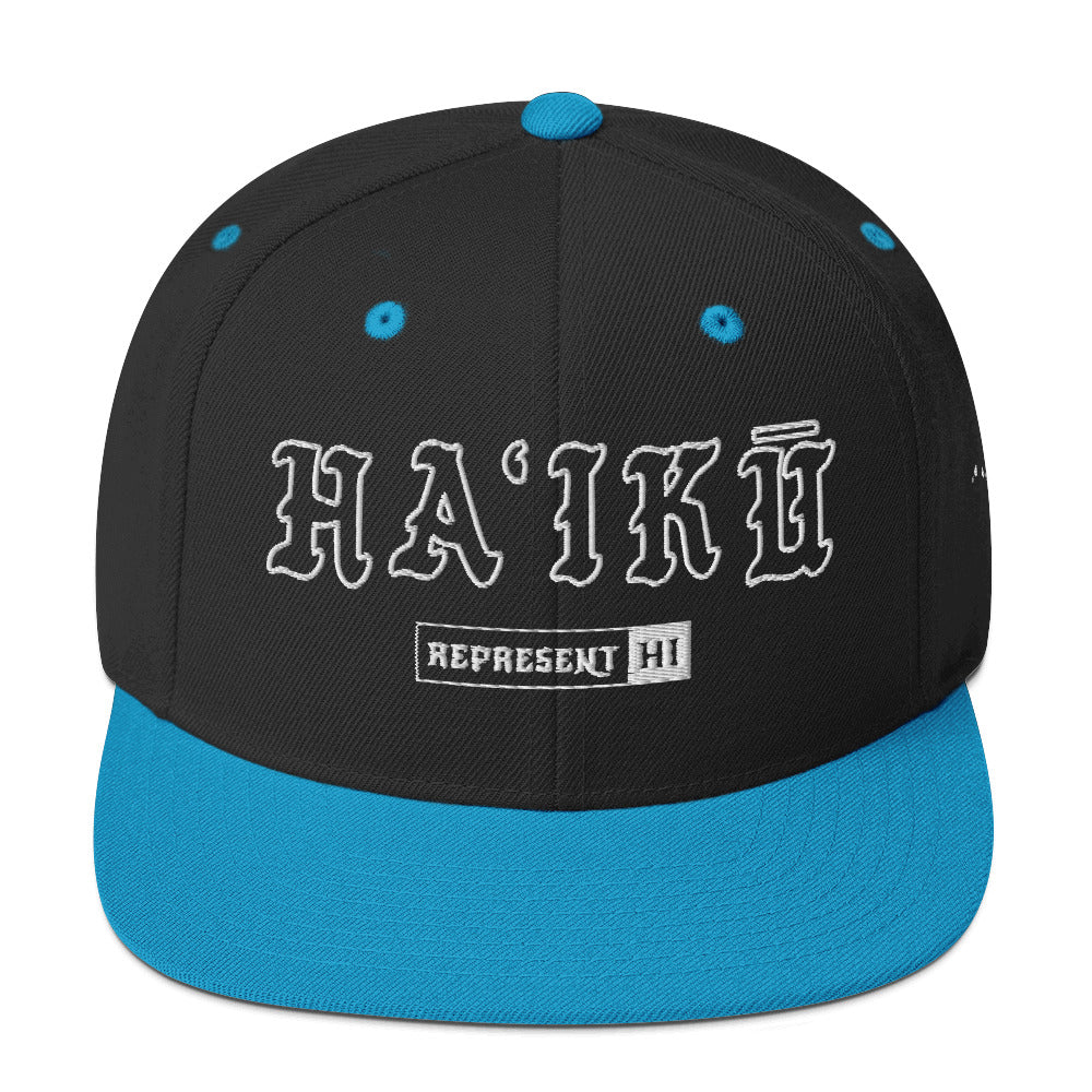 HaʻIkū Snapback Hat — Black/ Teal — front view